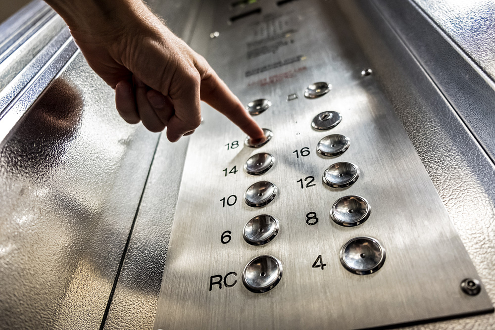 From inside the elevator, the effects of acceleration and gravity are indistinguishable.