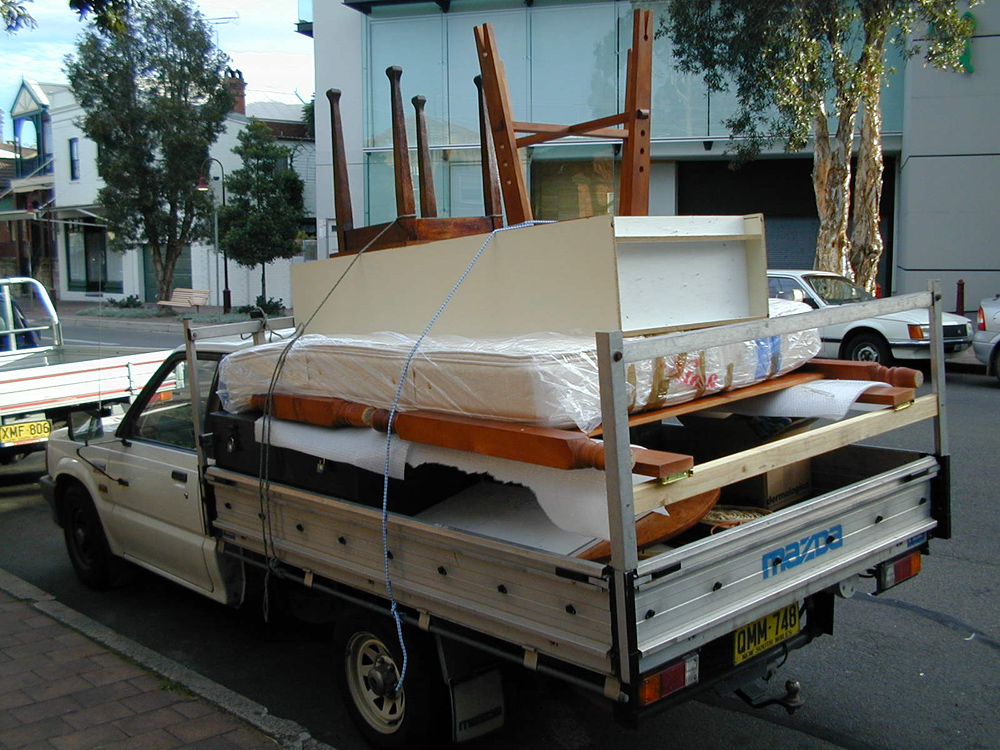 I deleted nearly all my photos from those times, but I still have this one of my final move from North Sydney to the Blue Mountains in 2002. I still have most of this furniture. Unfortunately I don't still have the VH Commodore on the other side of the road.